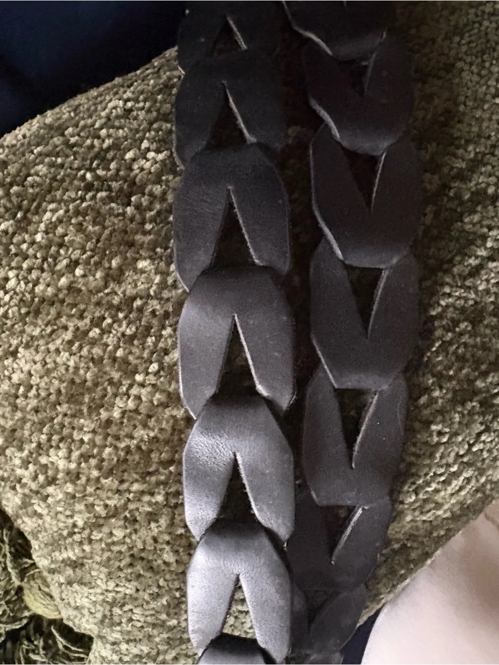 Vintage leather belt with a looped design  Black leather